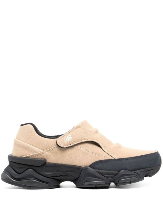 New Balance 8040 slip-on sneakers feature a suede upper in an incense and sandstone