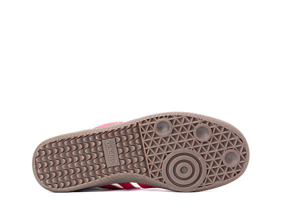 Samba Love x Comme Des Garçons sneaker featuring a white and pink leather upper with a heart