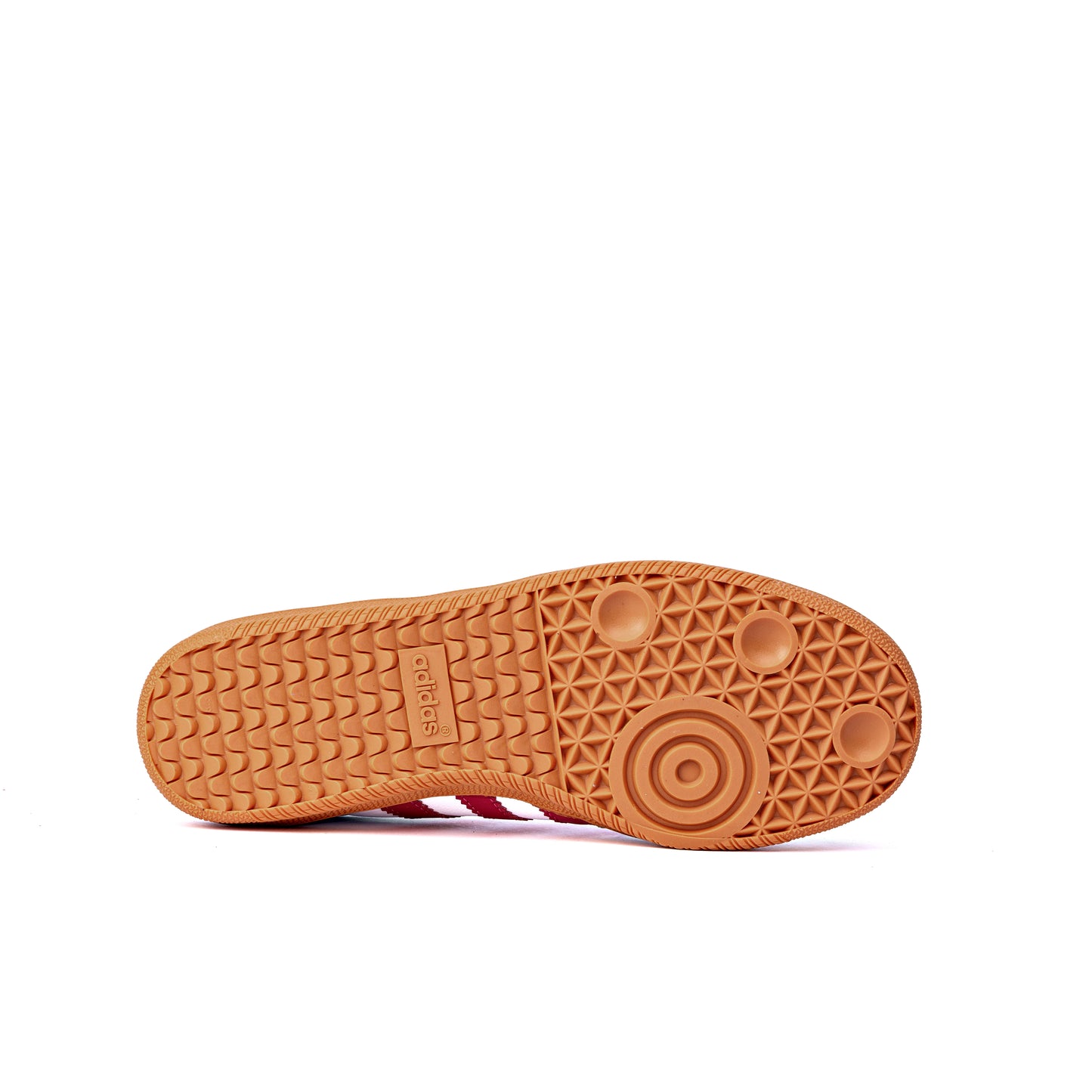 Samba OG sneakers feature a white leather upper contrasted by red stripes and a heel counter