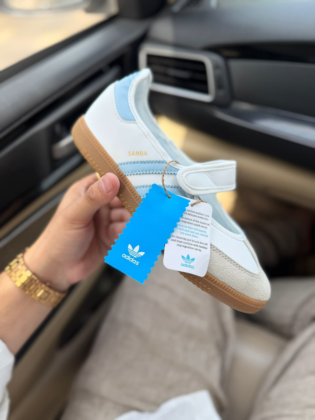 Samba Jane White-sky sneakers feature a distinctive halo blue striped design and a secure hook-and-loop strap