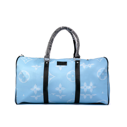 Louis Vuitton style travel duffel bag features a classic monogram pattern with contrasting dark vertical reinforcement bands and protective plastic wrapping on the top handles 50x30x25cm Unisex (blue)