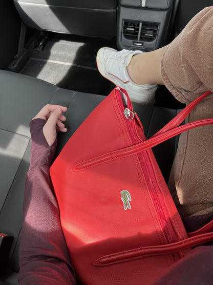 Lacoste L.12.12 Concept Tote bag featuring the brand's signature embroidered green crocodile logo