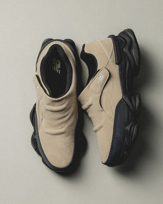 New Balance 8040 slip-on sneakers feature a suede upper in an incense and sandstone