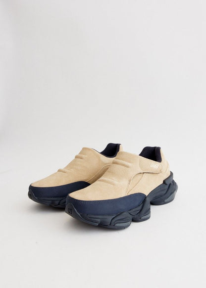 New Balance 8040 slip-on sneakers feature a suede upper in an incense and sandstone