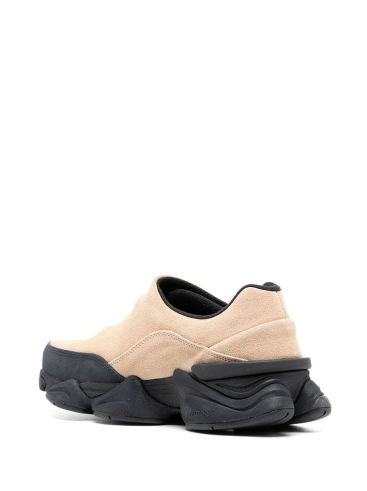 New Balance 8040 slip-on sneakers feature a suede upper in an incense and sandstone