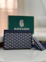 Goyard Chypre wallet on strap featuring the iconic chevron Goyardine coated canvas and a matching detachable small pouch