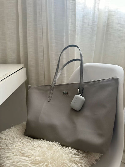 Lacoste L.12.12 Concept Tote bag featuring the brand's signature embroidered green crocodile logo
