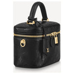 LV Vanity PM crafted in the iconic Monogram coated canvas with a top handle, gold-tone zipper, and a small padlock with box
