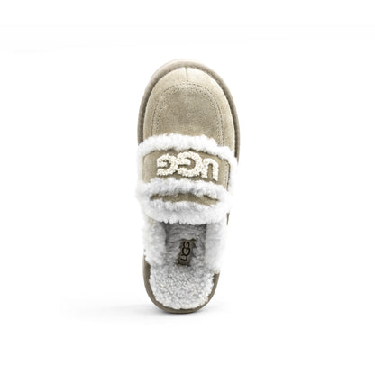 Trisha Fluffy Platform Ugg slipper in a tan/antelope brown color