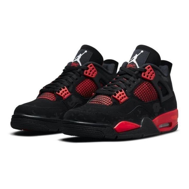 Air Jordan 4 Retro "Red Thunder" sneakers with a striking black upper and contrasting red mesh detailing