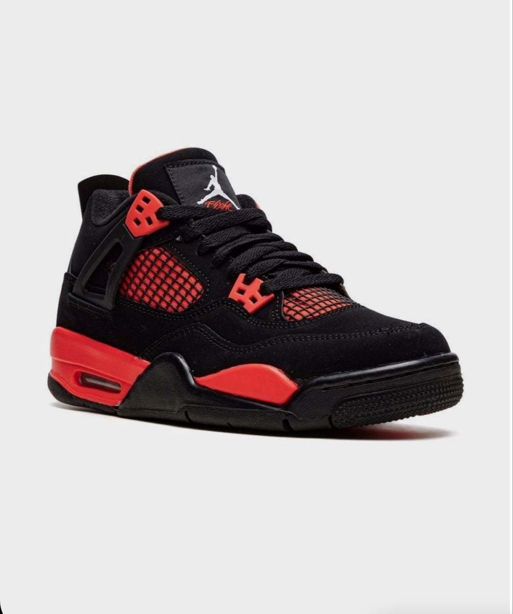 Air Jordan 4 Retro "Red Thunder" sneakers with a striking black upper and contrasting red mesh detailing