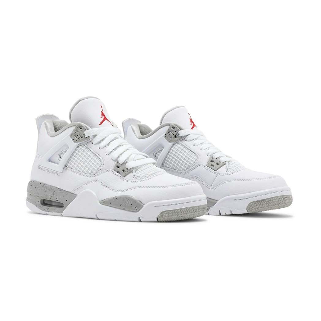 Air Jordan 4 Retro "White Oreo" sneakers featuring a white tumbled leather upper with signature speckled grey eyelets and midsole accents