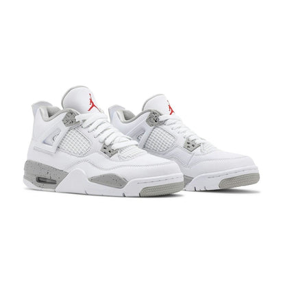 Air Jordan 4 Retro "White Oreo" sneakers featuring a white tumbled leather upper with signature speckled grey eyelets and midsole accents
