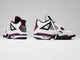 Air Jordan 4 Retro 'Paris Saint-Germain' featuring a distinctive circular PSG crest on the maroon-and-white heel tab