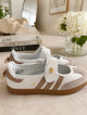 Samba Jane sneakers, featuring a charming ruffled Mary Jane strap and a classic gum sole