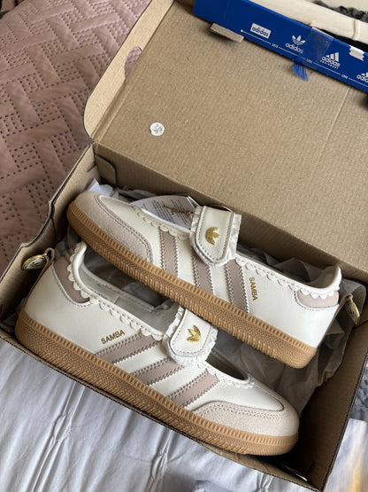 Samba Jane sneakers, featuring a charming ruffled Mary Jane strap and a classic gum sole