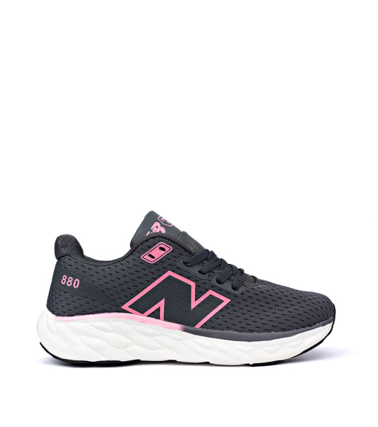 Fresh Foam Arishi v4 running shoe in a dark grey colorway with pink
