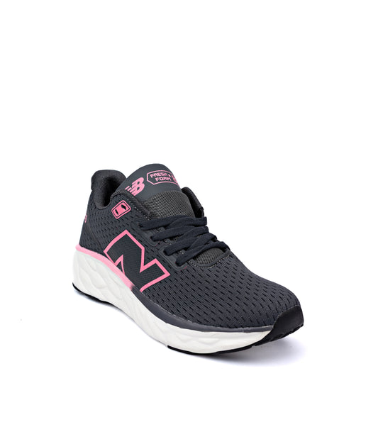 Fresh Foam Arishi v4 running shoe in a dark grey colorway with pink