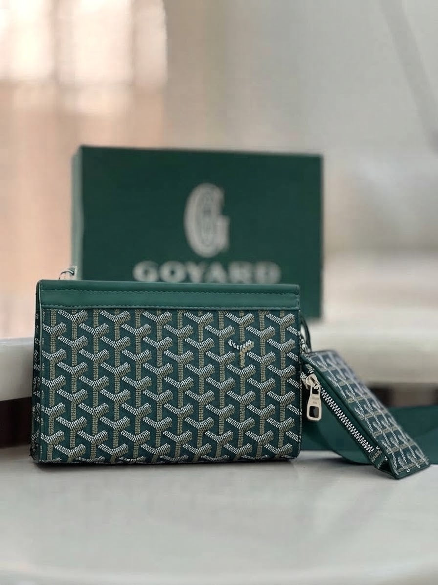 Goyard Chypre wallet on strap featuring the iconic chevron Goyardine coated canvas and a matching detachable small pouch