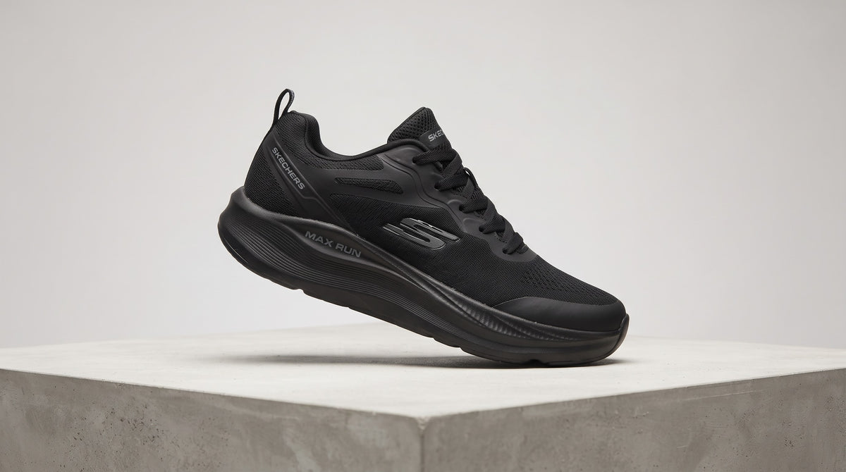 Skechers Max Run athletic sneaker with a textured mesh upper and a cushioned midsole