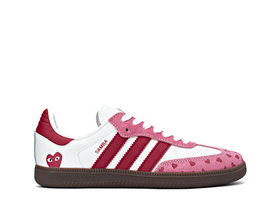 Samba Love x Comme Des Garçons sneaker featuring a white and pink leather upper with a heart