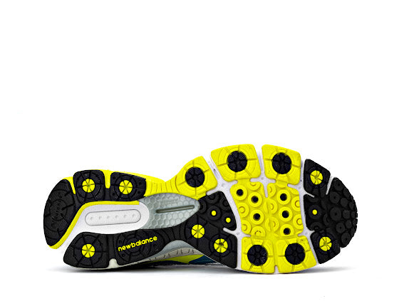 NB860v3 stability running shoe in blue, silver, and yellow women