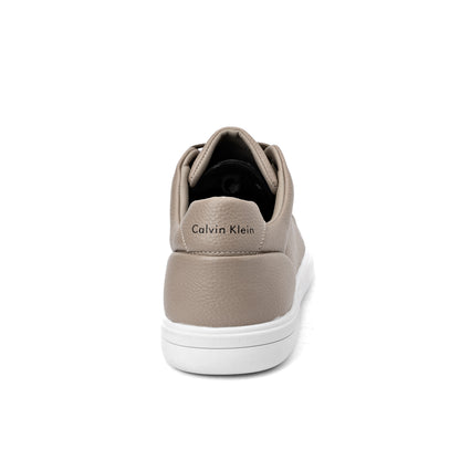 Calvin Klein Grissom men's sneaker in a taupe/beige color and a faux leather upper