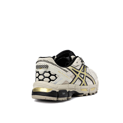 Asics Gel-Kahana 8 running shoe in a light beige/khaki and yellow