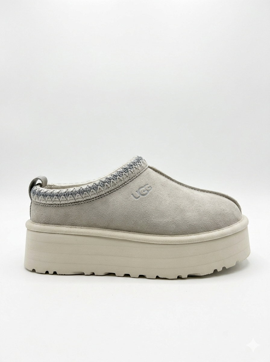 UGG Women's Tazz Slipper is a platform slipper featuring signature suede in a Grey