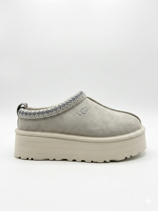 UGG Women's Tazz Slipper is a platform slipper featuring signature suede in a Grey