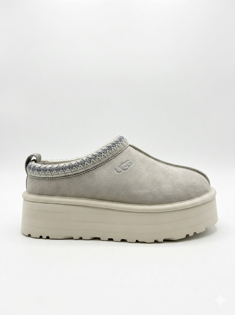 UGG Women's Tazz Slipper is a platform slipper featuring signature suede in a Grey