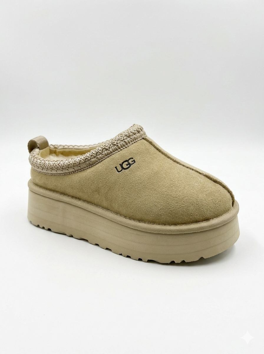 UGG Tazz slipper is a fashionable platform shoe made from suede with a cozy