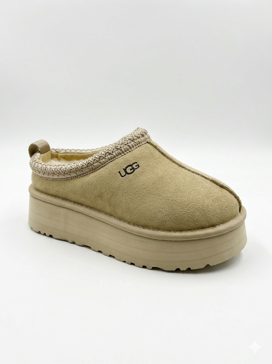 UGG Tazz slipper is a fashionable platform shoe made from suede with a cozy