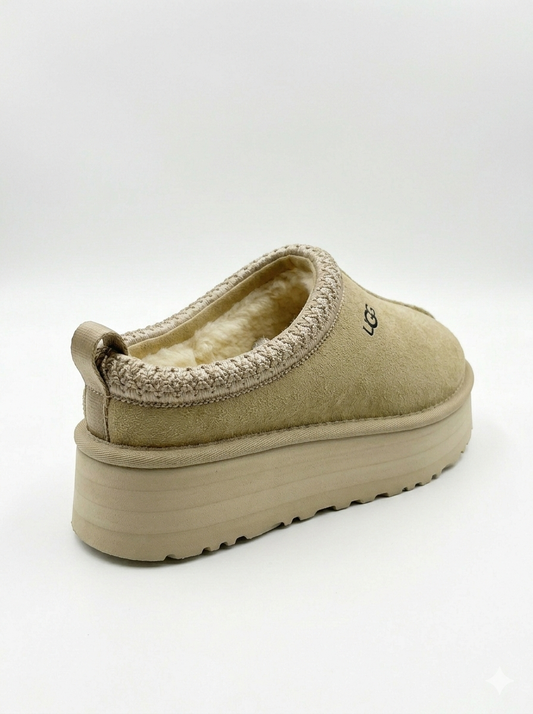 UGG Tazz slipper is a fashionable platform shoe made from suede with a cozy