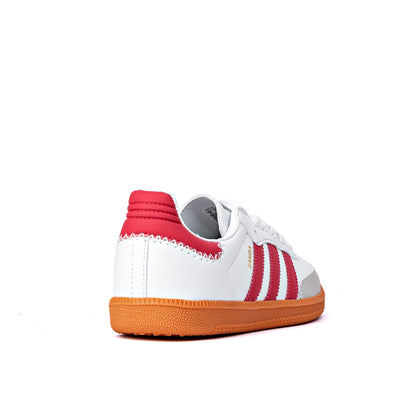 Samba OG sneakers feature a white leather upper contrasted by red stripes and a heel counter