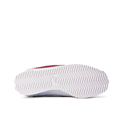 Cortez Forrest Gump sneakers, featuring a white leather upper and signature red swoosh