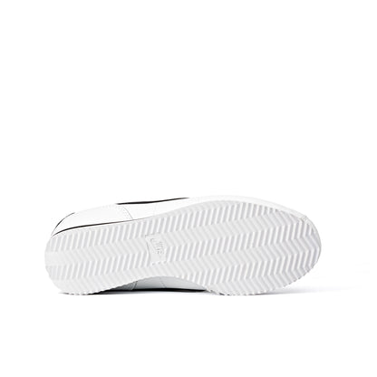 Cortez shoes featuring a classic white leather upper with a contrasting black Swoosh logo
