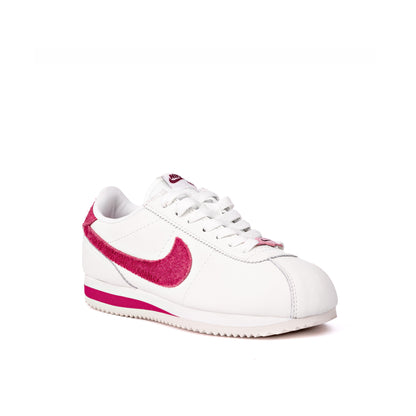 Cortez Basic SL GS sneakers in white with a fuchsia pink suede