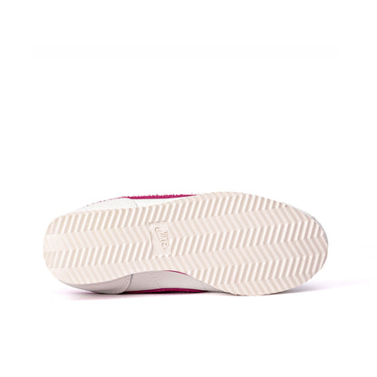 Cortez Basic SL GS sneakers in white with a fuchsia pink suede
