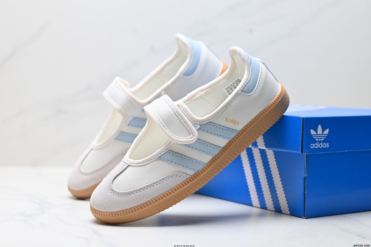 Samba Jane White-sky sneakers feature a distinctive halo blue striped design and a secure hook-and-loop strap