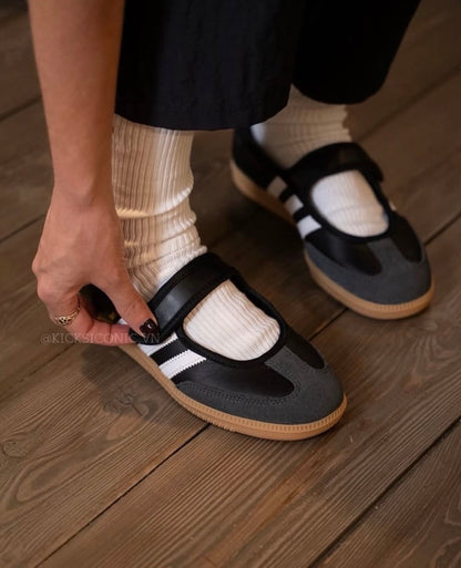 Samba Jane Black shoes feature a classic leather upper and a modern Mary Jane strap aesthetic