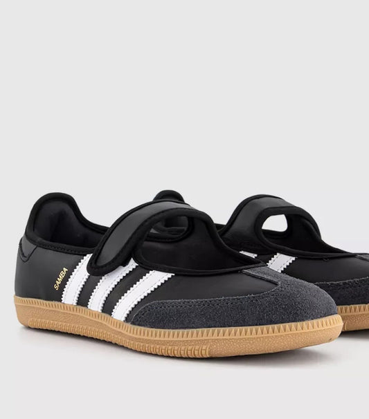 Samba Jane Black shoes feature a classic leather upper and a modern Mary Jane strap aesthetic