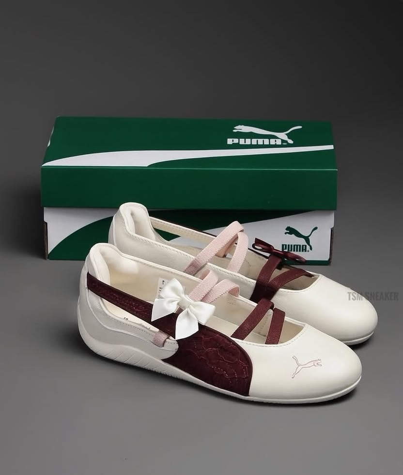 Speedcat Ballet flats featuring a cream body and a maroon shimmer