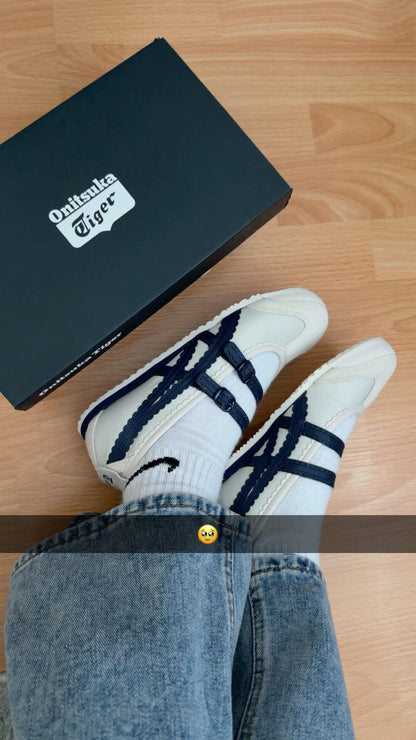 Onitsuka Tiger Mexico 66 TGRS sneakers in a cream and navy colorway with distinctive buckled straps.