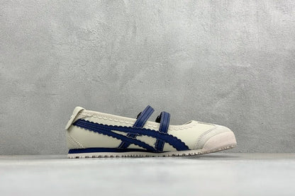 Onitsuka Tiger Mexico 66 TGRS sneakers in a cream and navy colorway with distinctive buckled straps.