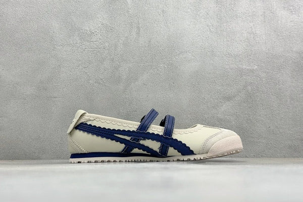Tiger Mexico 66 TGRS sneakers in a cream and navy colorway with distinctive buckled straps.