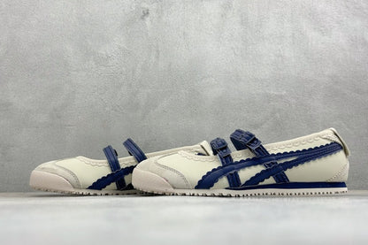 Onitsuka Tiger Mexico 66 TGRS sneakers in a cream and navy colorway with distinctive buckled straps.