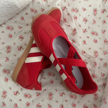 Adidas Samba Jane sneakers in a striking red colorway featuring a hook-and-loop