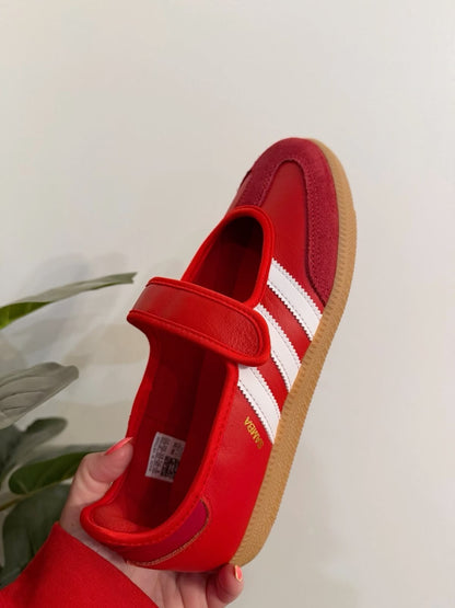Adidas Samba Jane sneakers in a striking red colorway featuring a hook-and-loop