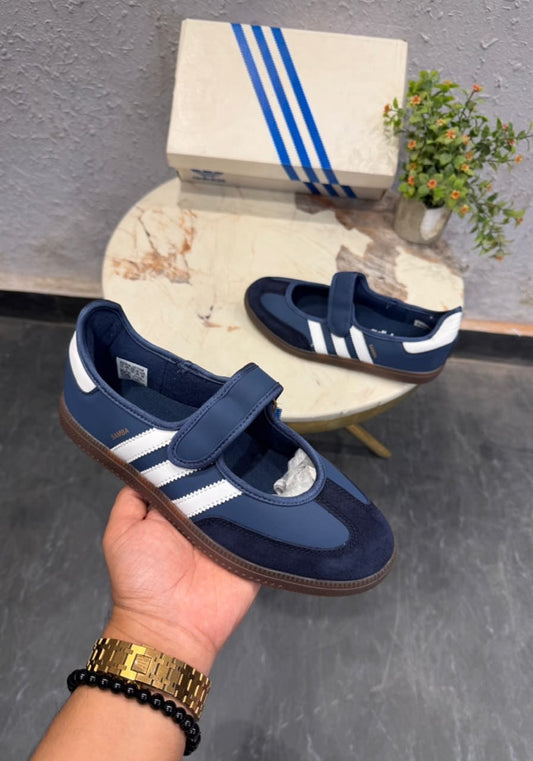 Samba Jane Shoes feature a navy leather upper and a single-strap Mary Jane